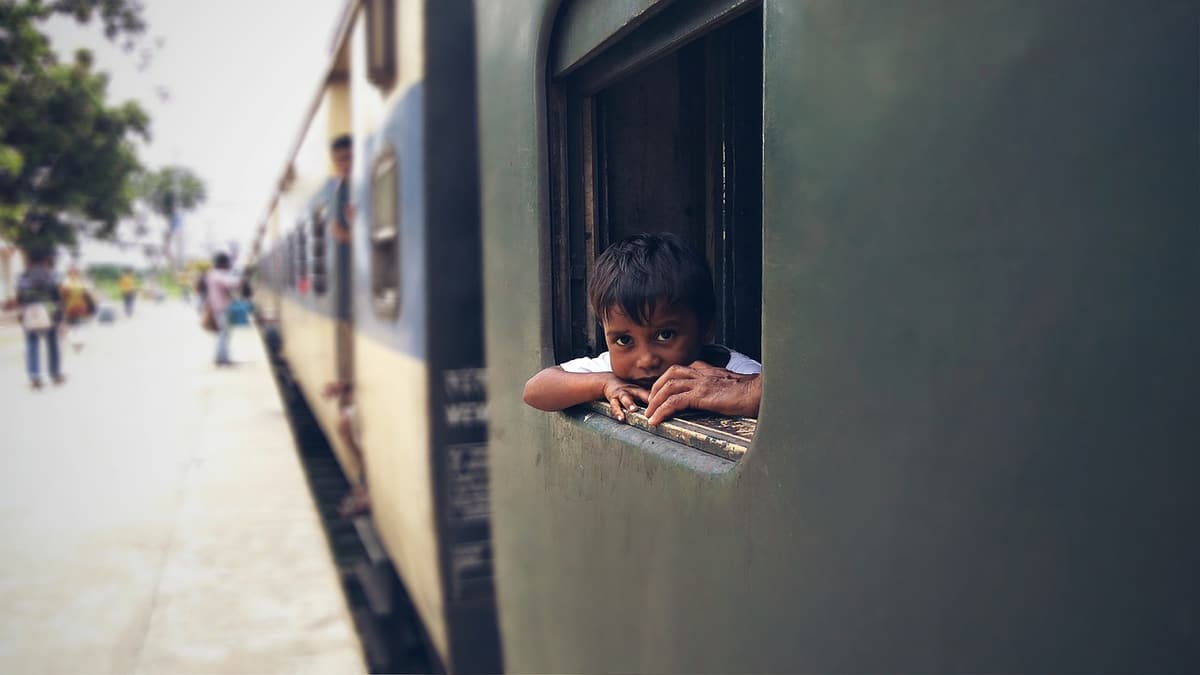 An Indian Railways train running on a broad-gauge line in India